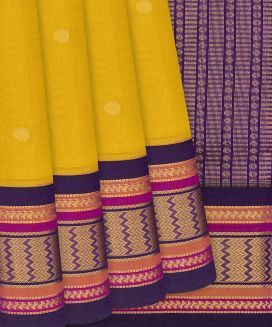 Lime Yellow Handloom Silk Cotton Saree with contrast purple border and pallu
