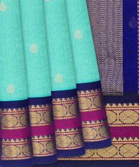 Turquoise Handloom Silk Cotton Saree with contrast blue border and pallu
