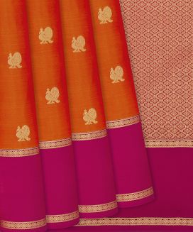 Orange Kanchipuram Silk Saree With Peacock motifs and contrast border & pallu
