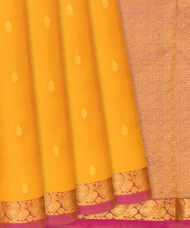 Yellow Kanchipuram Silk Saree With annam motifs and  contrast border & pallu

