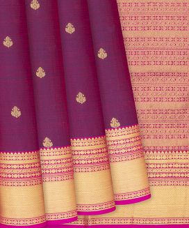 Magenta Kanchipuram Silk Saree With Floral motifs

