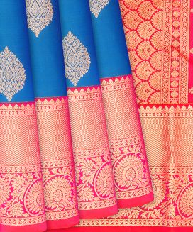 Blue Kanchipuram Silk Saree With contrast pink border and pallu
