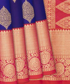 Violet Kanchipuram Silk Saree With contrast pink border and pallu
