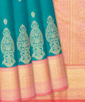 Teal Kanchipuram Silk Saree With contrast baby pink border and pallu
