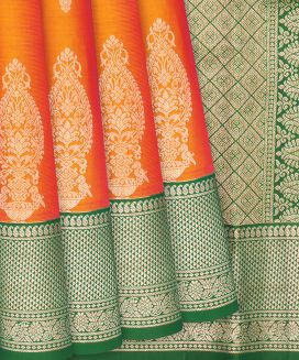 Orange Kanchipuram Silk Saree With contrast green border and pallu
