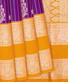 Magenta Kanchipuram Silk Saree With Stripes & Flower Buttas
