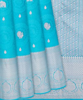 Turquoise Silk Saree With Floral Motifs & Buttas
