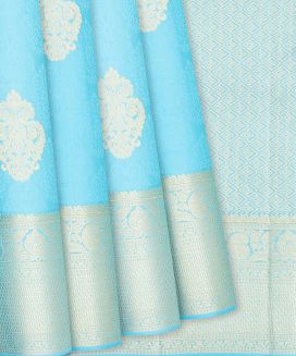 Aquamarine Silk Saree With Floral Jaal Motifs
