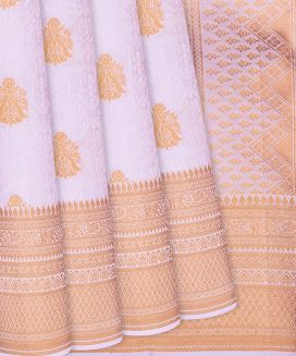 Baby Pink Silk Saree With Floral Motifs & Peacock Buttas
