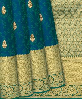 Blue Silk Saree With Floral Motifs & Mango Buttas

