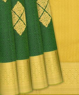 Green Silk Saree With Floral Motifs & Buttas
