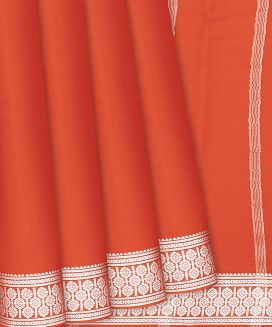 Orange Plain Mysore Crepe Silk Saree With Floral Motifs Border 
