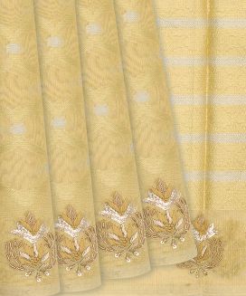 Cream Woven Tissue Saree With Jaal Motifs
