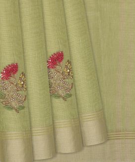 Cardamom Green Woven Tissue Saree With Embroidered Floral Motifs
