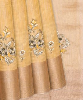 Sandal Tissue Embroidered Saree With Floral Butta Motifs

