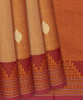 Mustard Handloom Village Cotton Saree With Temple Border And Traditional Motifs

