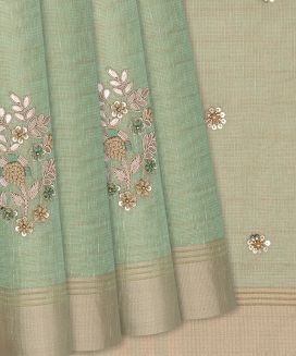 Light Blue Woven Tissue Saree With Embroidered Floral Motifs

