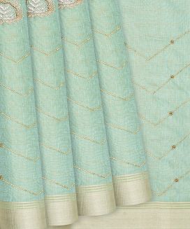 Turquoise Tissue Embroidered Saree With Floral Butta Motifs
