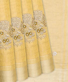 Light Yellow Tissue Embroidered Saree With Floral Motifs

