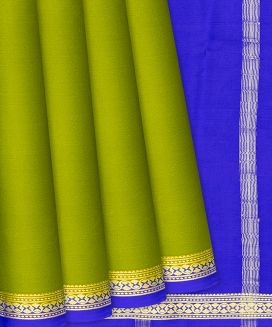 Light Green Mysore Plain Crepe Silk Saree With Purple Selvage Border
