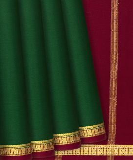 Dark Green Mysore Plain Crepe Silk Saree With Crimson Selvage Border
