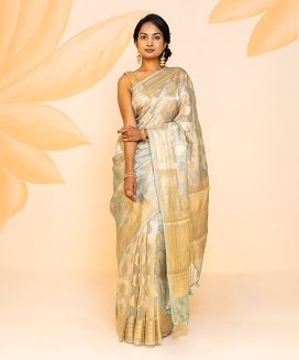 Turquoise Woven Tissue Silk Saree With Floral Motifs
