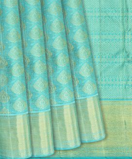 Turquoise Handloom Kanchipuram Silk Saree With Floral Motifs