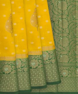 Yellow  Benarasi woven Dupion Silk Saree  With Flower Butta & Vine Motifs in Contrast Evening Morning Green Border