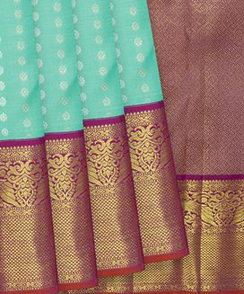 Turquoise Handwoven Kanchipuram Korvai Silk Saree With Kamalam Motifs & Peacock Motifs in Contrast Pink Border