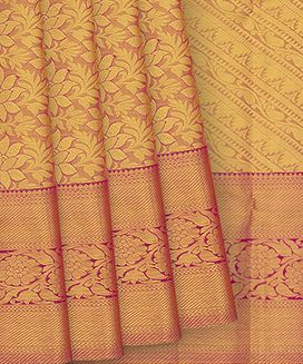 Gold Handwoven Kanchipuram Tissue Silk Saree With Floral Motifs