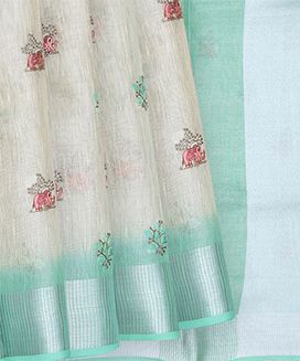 Off White Blended Linen Saree with Elephant and Flower Embroidery with Light Blue Border and Pallu