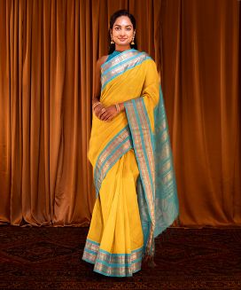 Yellow Handloom Korvai Silk Cotton Saree With Turquoise Border
