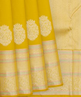Yellow Handwoven Kanchipuram Silk Saree With Flower Butta & Mango Motifs in Silver Zari Border