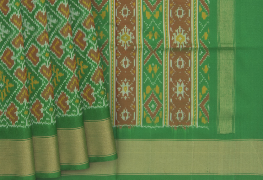 Classy Dark Green Patola Silk Saree with Extraordinary Blouse Piece –  LajreeDesigner